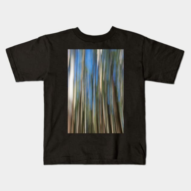 blurred trees Kids T-Shirt by sma1050